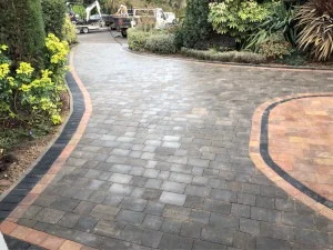 Block-paved driveway with brick edging
