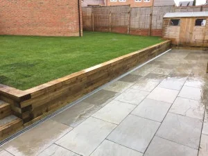 Modern garden patio with stone paving